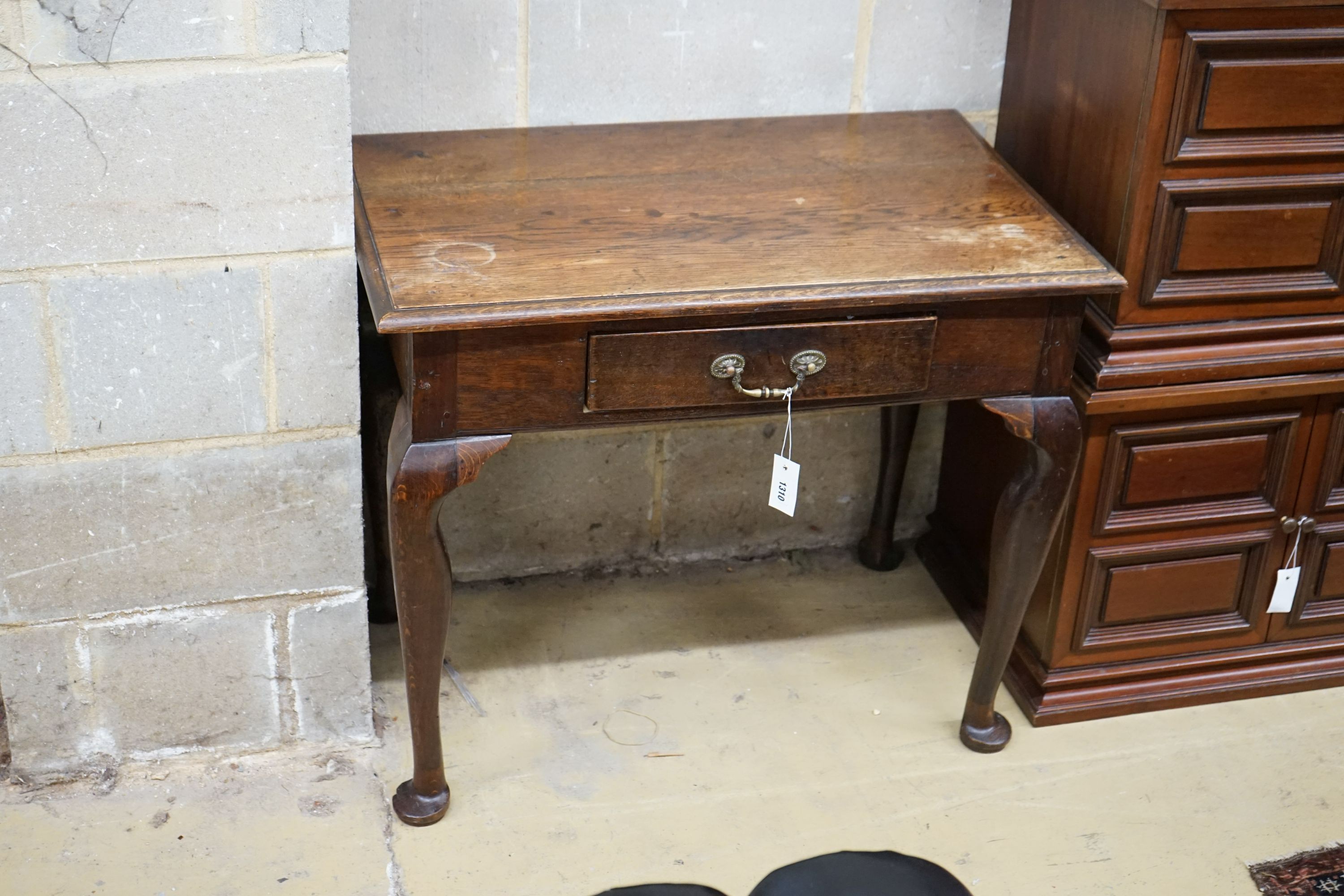 An 18th century oak low boy, width 85cm, depth 54cm, height 71cm